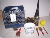 large bolts, funnels, paint brushes and crate