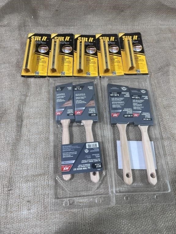 4 new paint brushes and 4 package openers