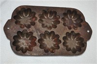 Vintage cast iron muffin mold