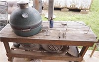 Big Green Egg Barbeque grill with table and
