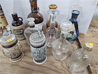 Whiskey decanters and beer steins
