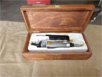 Die grinder in wood box