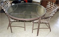 Lot #709 - Glass top patio table and two chairs