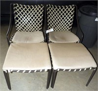 Lot #710 - Two open arm patio chairs and two