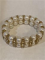 Double beaded pearl with gold trim