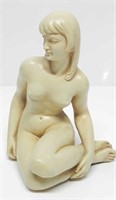 NUDE WOMAN FIGURINE