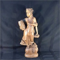 Beautiful 17.5" wood carved statue. Lady holding