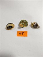 Gold trimmed shell pendants