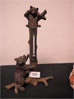 Iron figurine of thermometer tree stump and two