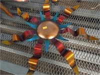 Metal sunburst wall art