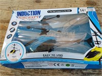 A toy helicopter ages 14+ still in original box