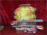 (4)NOS Lever action rifle Barbeque lighters.