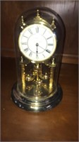 Howard Miller clock. Glass globe