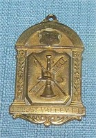 Antique first place ladder climbing award badge