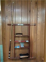 C.C. Steepleton Co cue rack and contents