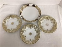 Four Plates with Gold Decoration