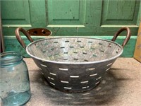 Old slotted olive bucket- planting, garden gather