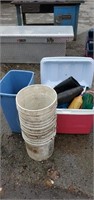 Muck boots, buckets , cooler and trash can