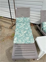 2 Plastic loungers & 1 table w/cushions
