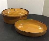 Vintage bakeware includes a covered oval baking