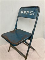 Metal Pepsi folding chair.