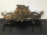 FIGURAL BRASS TIE HOLDER