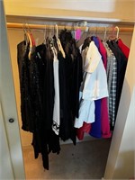 Women's Clothing in Closet
