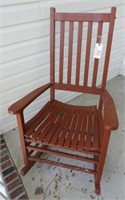 Red wooden slat seat porch rocker