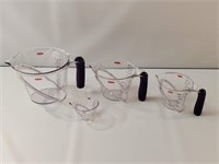 Four-piece set of OXO plastic measuring cups