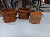 Longaberger baskets one 6x5x9 one 6in diameter