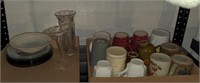 (G) Contents of shelf including, mugs, plates and