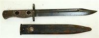 Vintage military bayonet in sheath