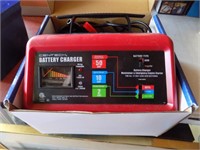 neew battery charger in box