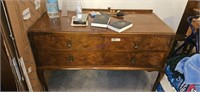 Dresser and contents pictured on top