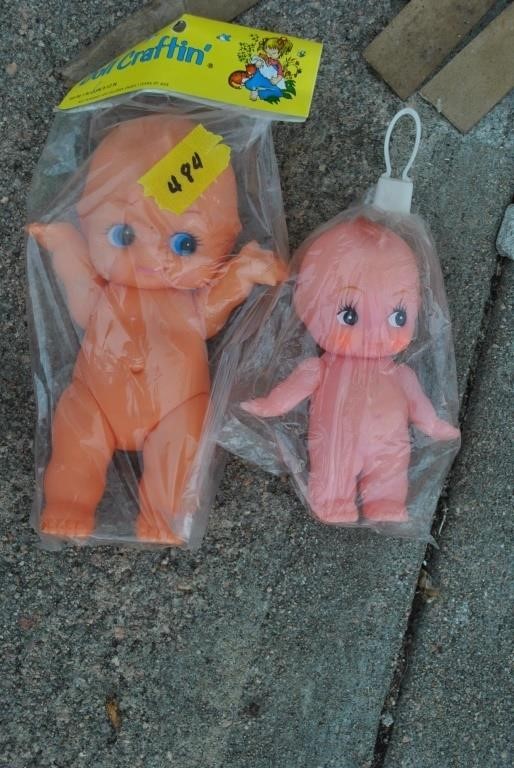 2 kewpie dolls
