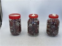 -3 jars of red and clear, glass marbles, and beads