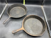 2 cast iron skillets - 1 #8 11in, 1 10in