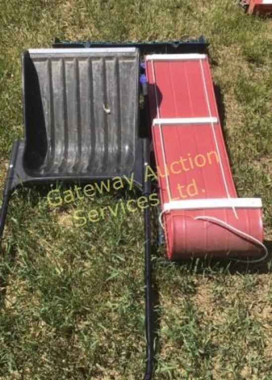 Snow shovels and aluminum toboggan.