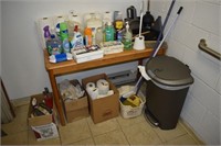 Bathroom supplies, brooms, trash can, etc.; as is