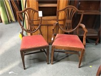 2 matching antqiue dining chairs