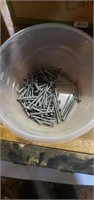 Lot of screws, nails,  stain and bingo markers.