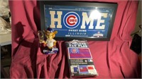 Cubs flag, bobble head, sign