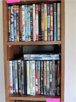 2 shelves of assorted DVDs