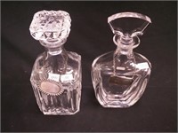 Two crystal decanters averaging 10", one signed
