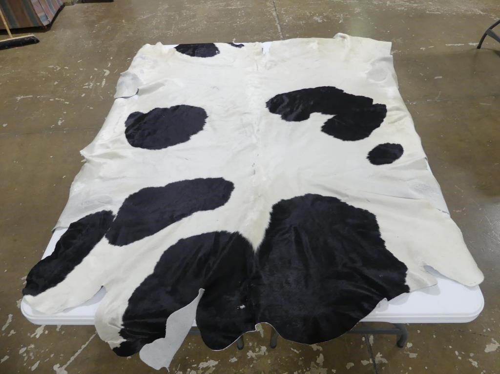 COW  HIDE APPROX. 89" X 70"