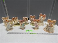 Angel figurines; some are musical