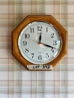 Wood framed wall clock