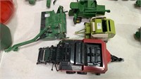 4 pieces of toy farm equipment - one John Deere by