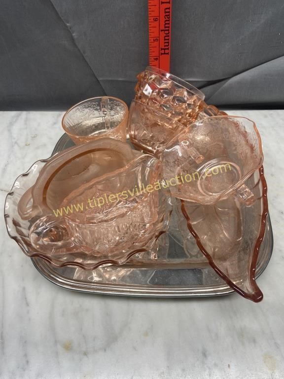 Pink depression glass on tray