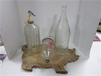 3 COLLECTIBLE BOTTLES AND PIG CUTTING BOARD
